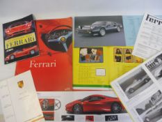 A selection of Ferrari brochures and sales literature.