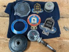 A selection of Morris badges including a blue enamel super sports ring, a Bullnose Morris Club