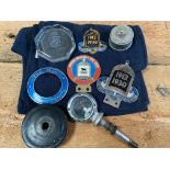 A selection of Morris badges including a blue enamel super sports ring, a Bullnose Morris Club