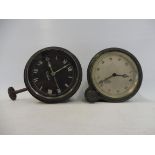 A North & Sons Watford black faced car clock and a silver faced Smiths eight day car clock.