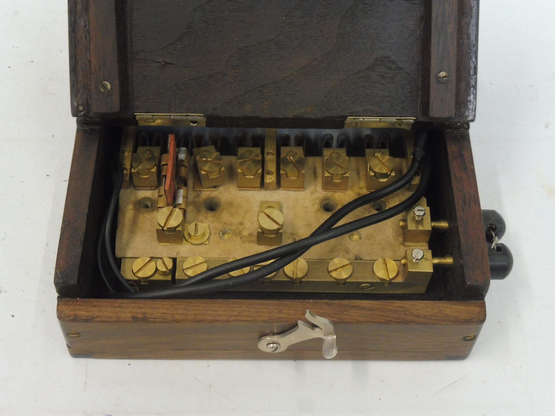 An Edwardian CAV bulkhead mounted switch panel, showing a voltmeter adjacent to an ammeter, above - Image 4 of 5