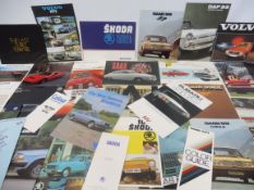 A selection of brochures including Daf, Saab, Skoda, Volvo and Datsun etc.