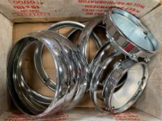 A box of mostly Mini/BMC headlamp rims etc, appear n.o.s.