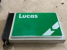 A Lucas double sided illuminated lightbox, 28 1/2 x 5 x 18".