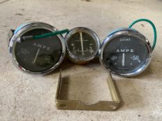 Three black faced ammeters, appear new old stock.