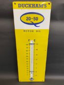 A Duckham's 20-50 enamel thermometer, in good condition, 13 x 36".