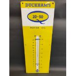 A Duckham's 20-50 enamel thermometer, in good condition, 13 x 36".