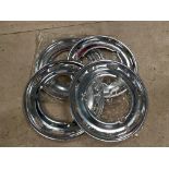 A set of four n.o.s. British Leyland chrome plated wheel trims.