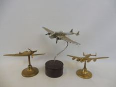 Three aeroplane desk stands including Spitfire etc.