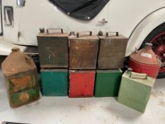 A Castrol five gallon can, one other, plus seven two gallon petrol cans including a Pratts