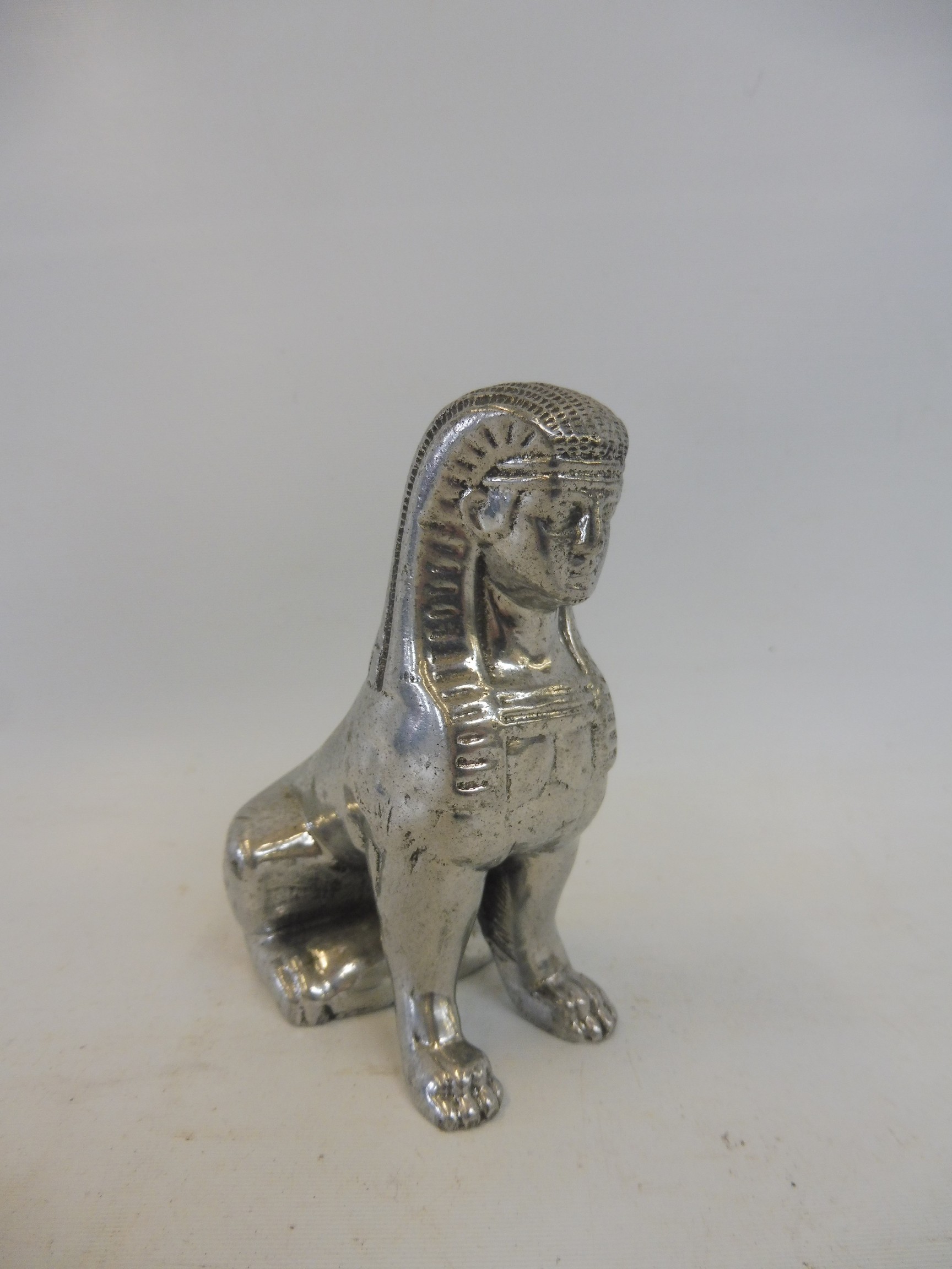 An Armstrong Siddeley type Sphinx mascot.