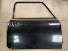 An offside door to suit Mini, possibly 1275 GT, appears n.o.s.