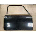 An offside door to suit Mini, possibly 1275 GT, appears n.o.s.