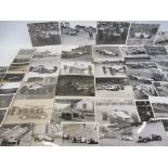 Approximately 60 car photgraphs plus a small amount of postcards, images of old single seater racing