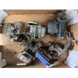 A small box of carburettors.