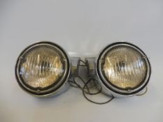 A pair of unusual Cadillac chrome plated fog lamps, circa 1950s.