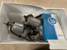 An SU carburettor with accompanying rebuild kit.