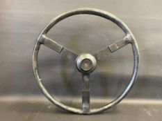 An Aston Martin DB2 racing quick release steering wheel.