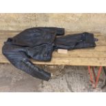 An Akito leather jacket and leather trousers.