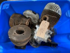 A box of Villiers engine parts including heads and barrels.