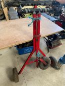 A folding Go Kart stand, jockey wheel needs repair.