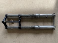 A set of Manx Norton front forks.