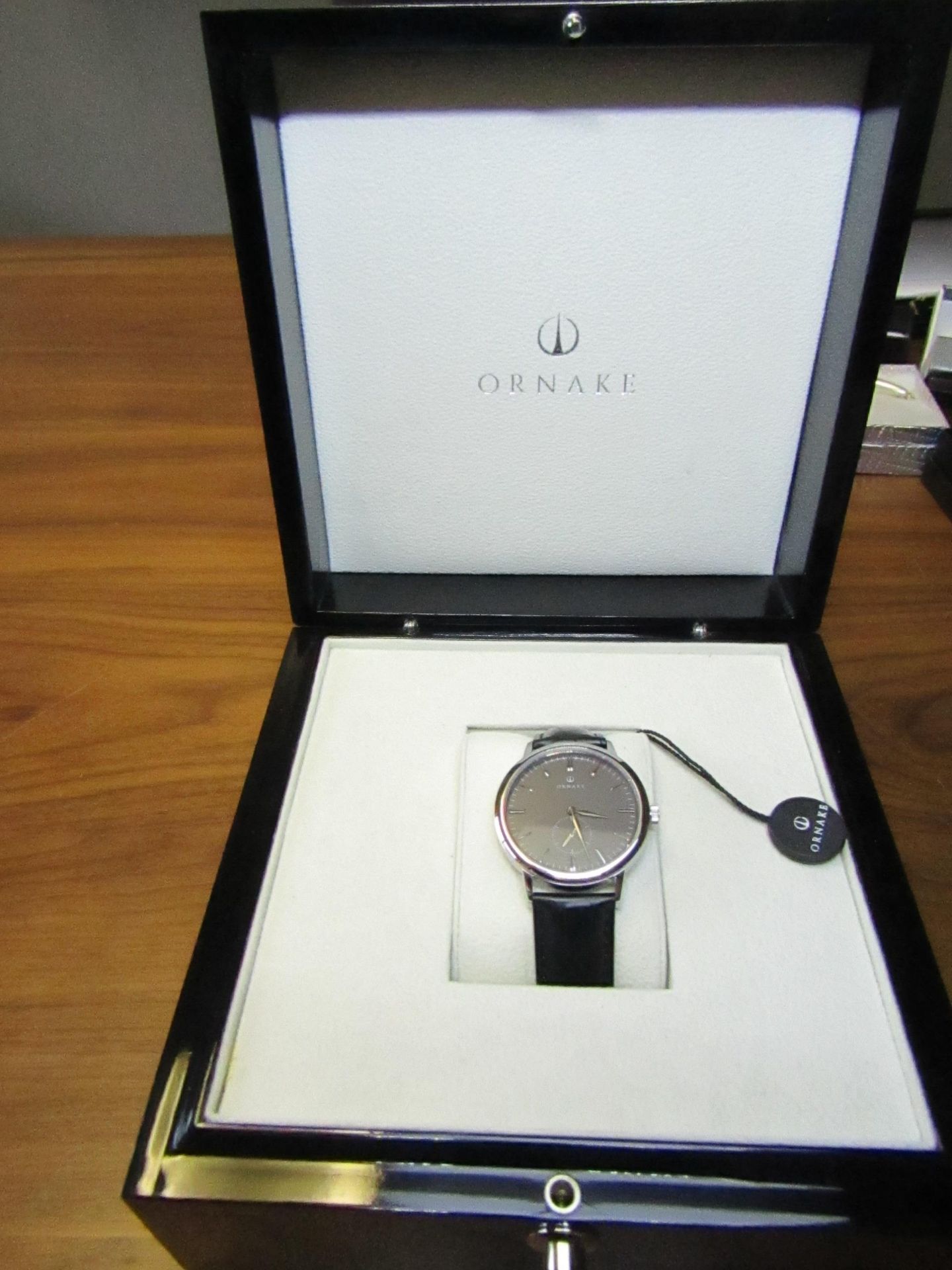 Ornake watch, miyota movement, black and Silver with black leather strap, new, Boxed and ticking.