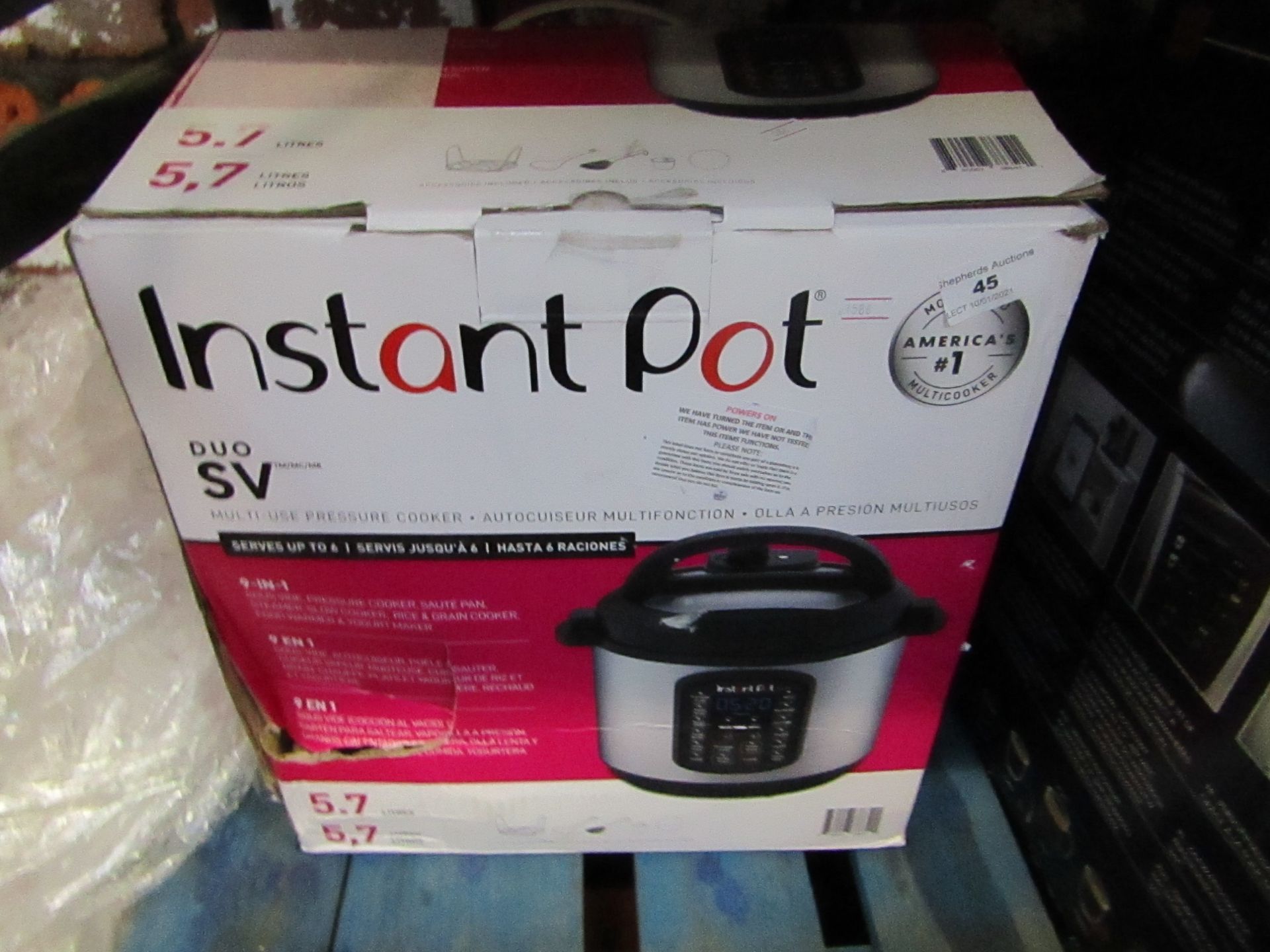 Instant Pot 5.7L prsssure cooker, powers on but not tested all functions and boxed.