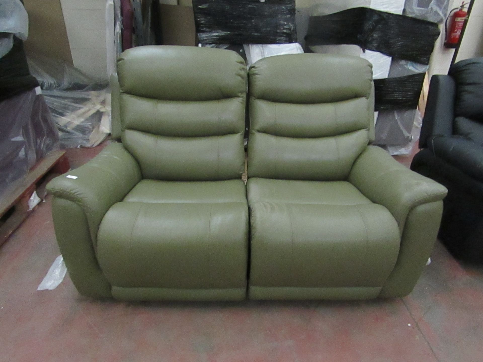 | 1X | 2 SEATER OLIVE GREEN LEATHER LA Z BOY MANUAL RECLINING SOFA IN VERY GOOD CONDITION, COMES