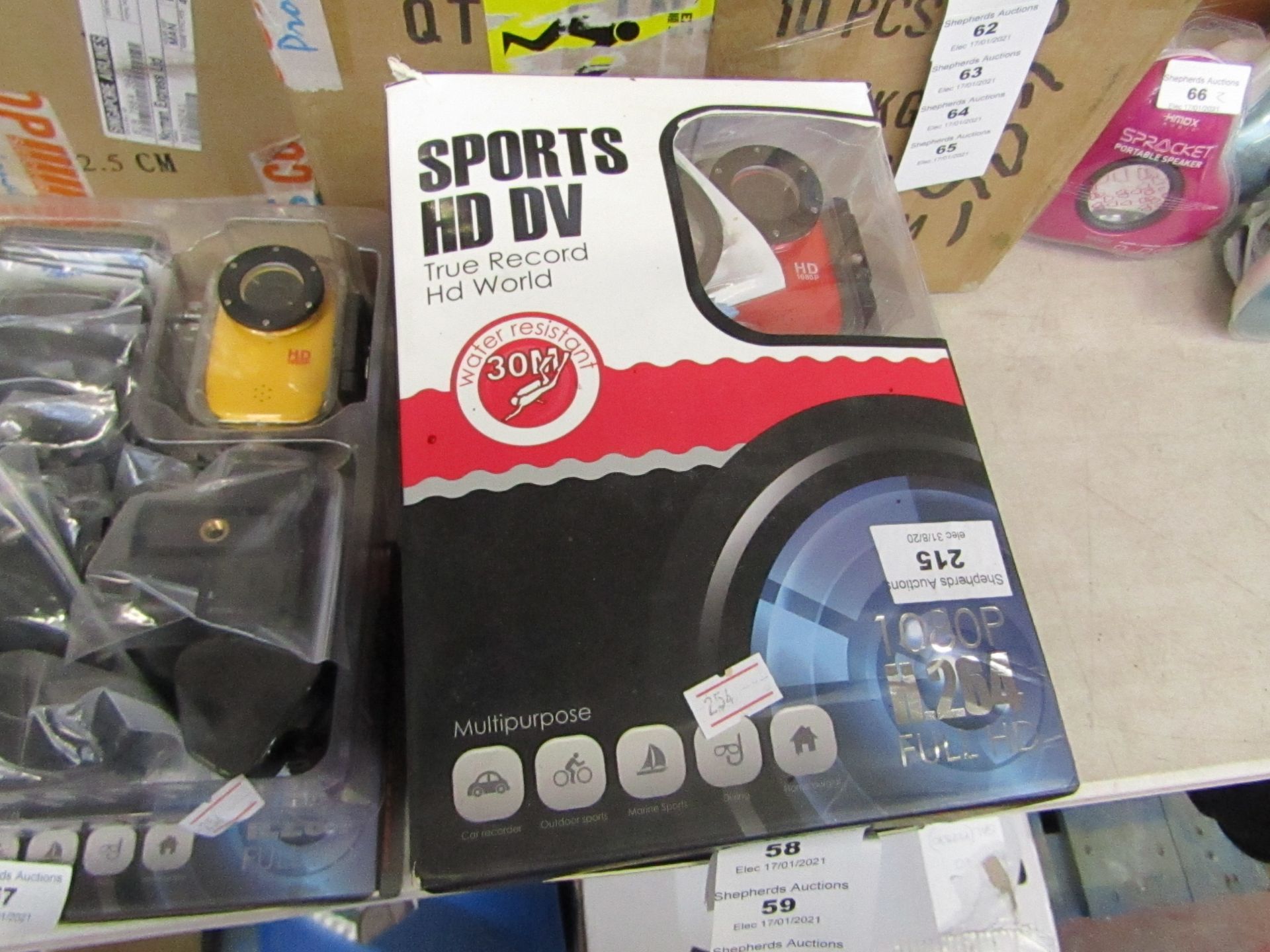 Sports HD DV action camera with accessories, tested working and boxed.