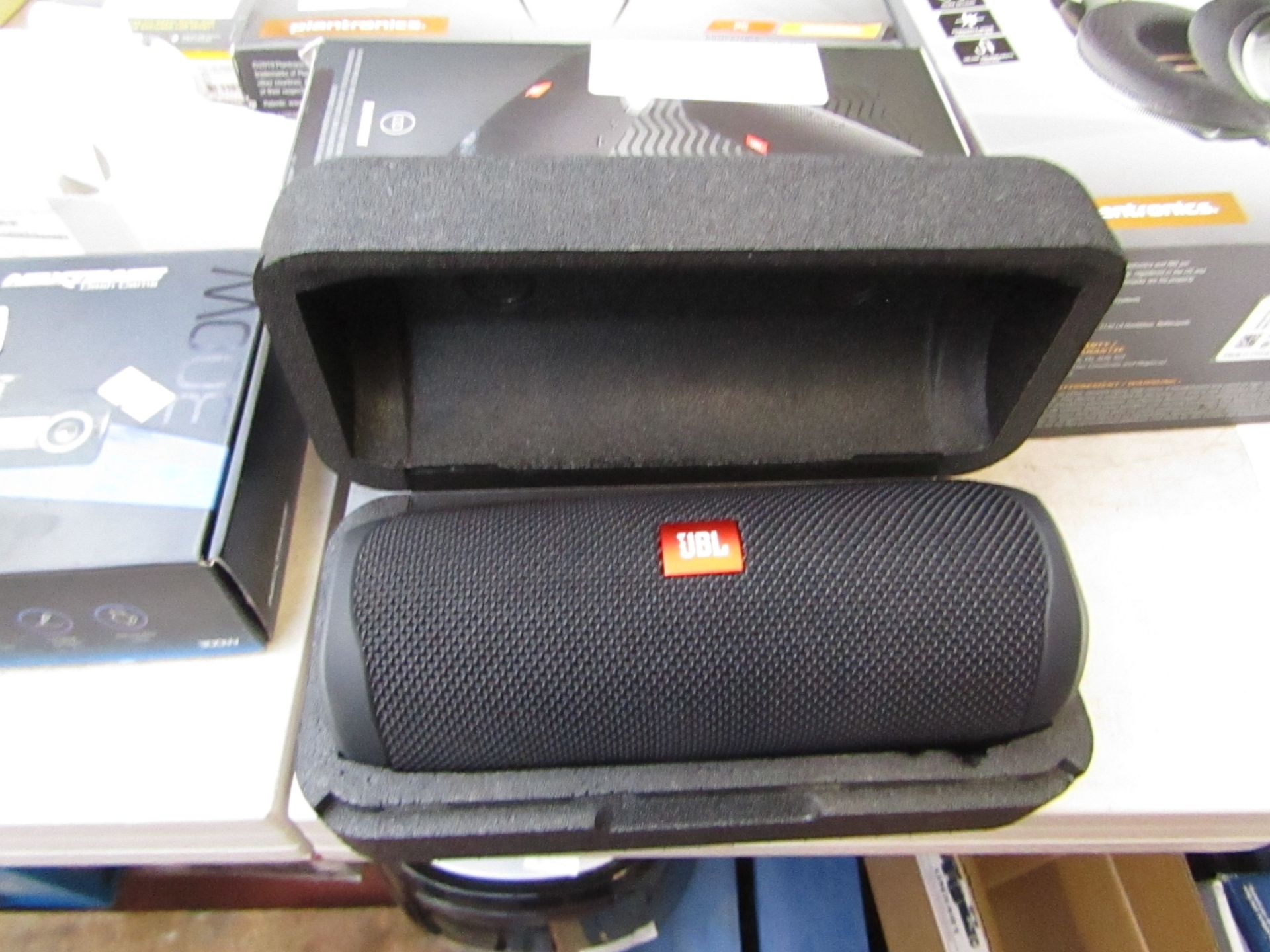 JBL wireless Bluetooth speaker with bass, tested working.