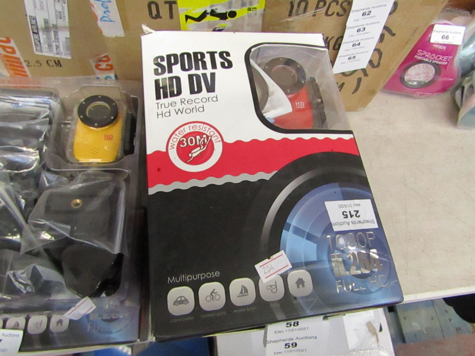 Sports HD DV action camera with accessories, tested working and boxed.
