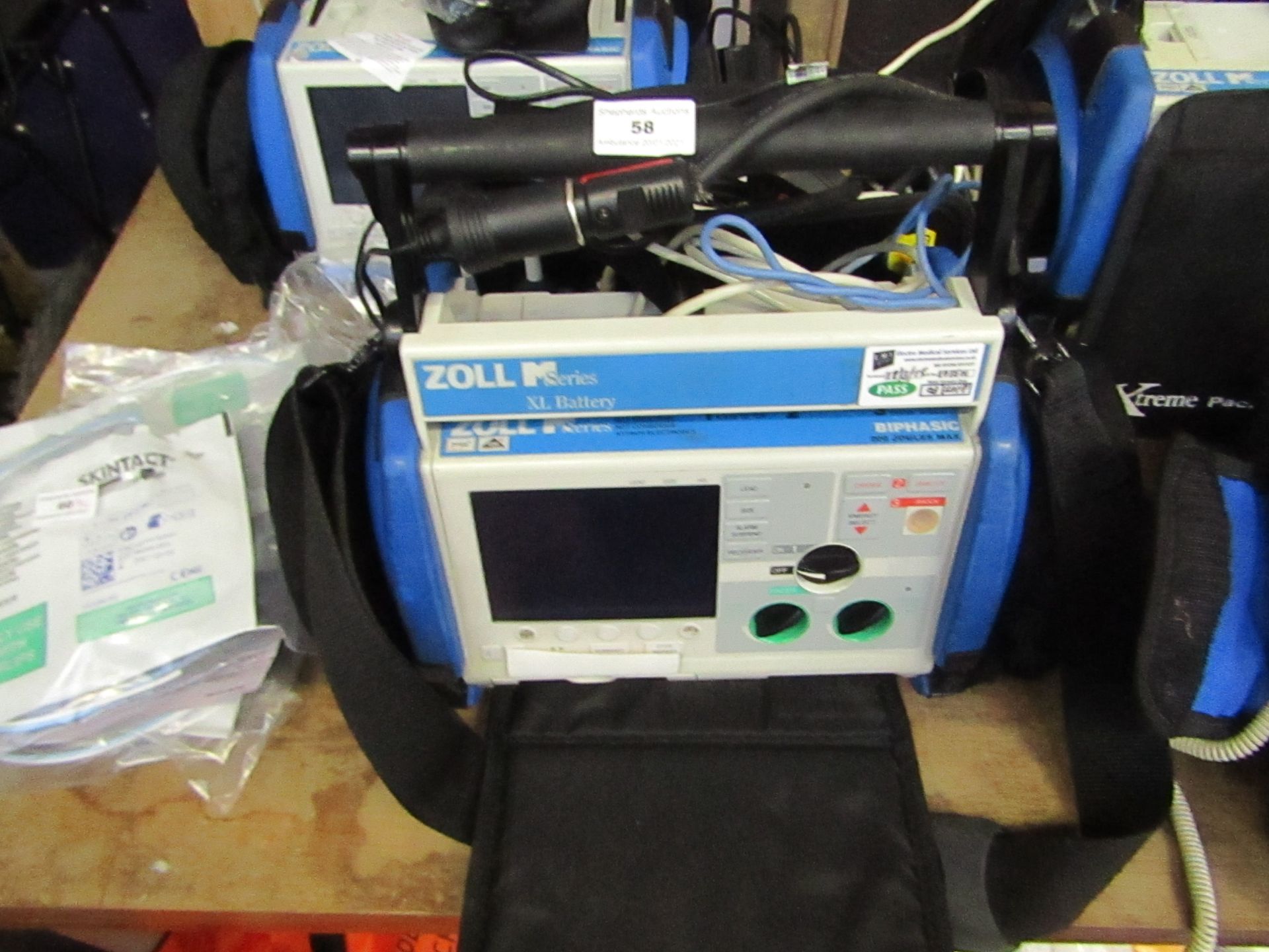 Zoll M Series biphasic defibrillator, powers on but not tested all functions.