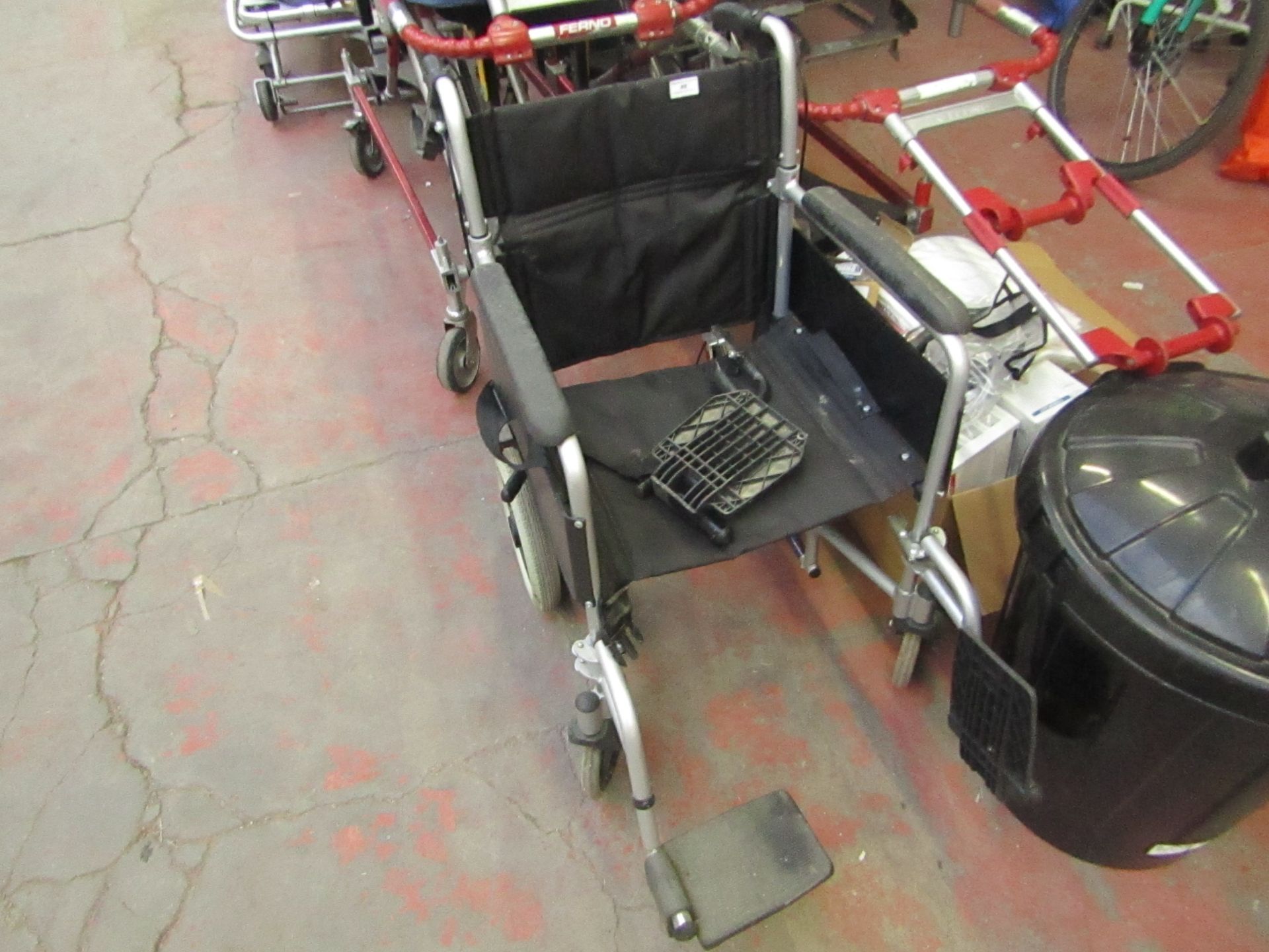 Fold away wheel chair