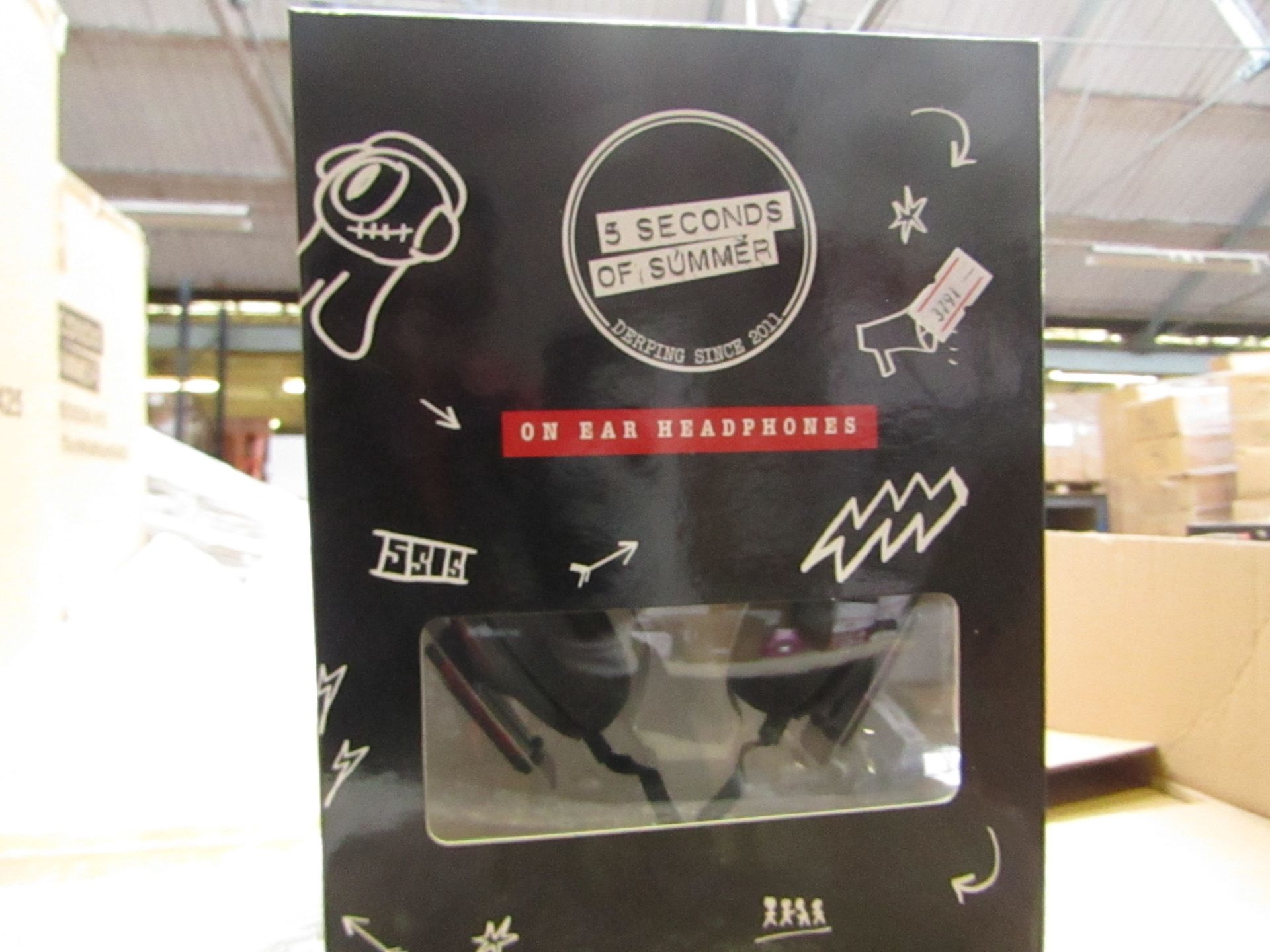 5x 5 Seconds of Summer headphones , new and boxed.