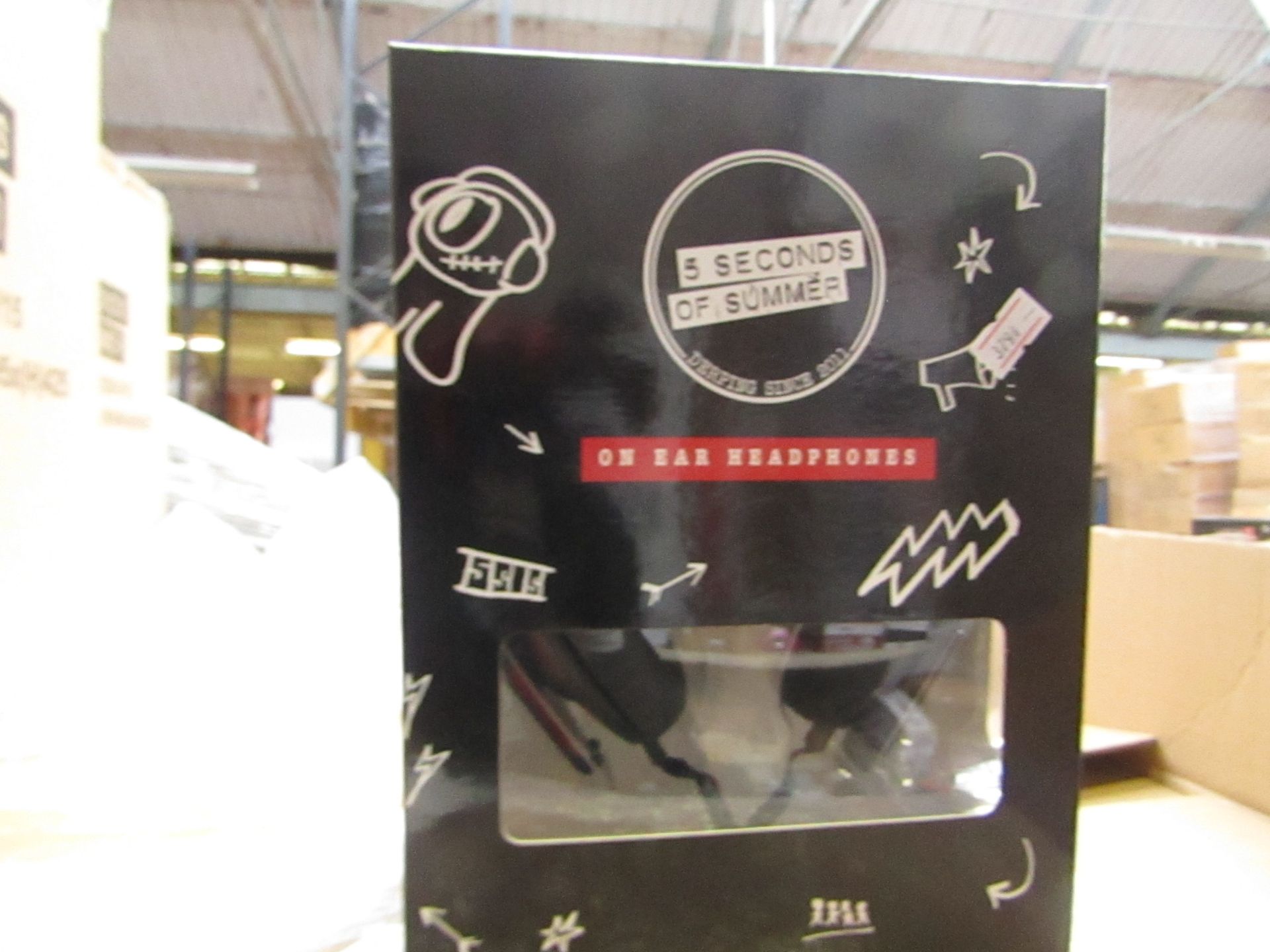 5 Seconds of Summer headphones , new and boxed.