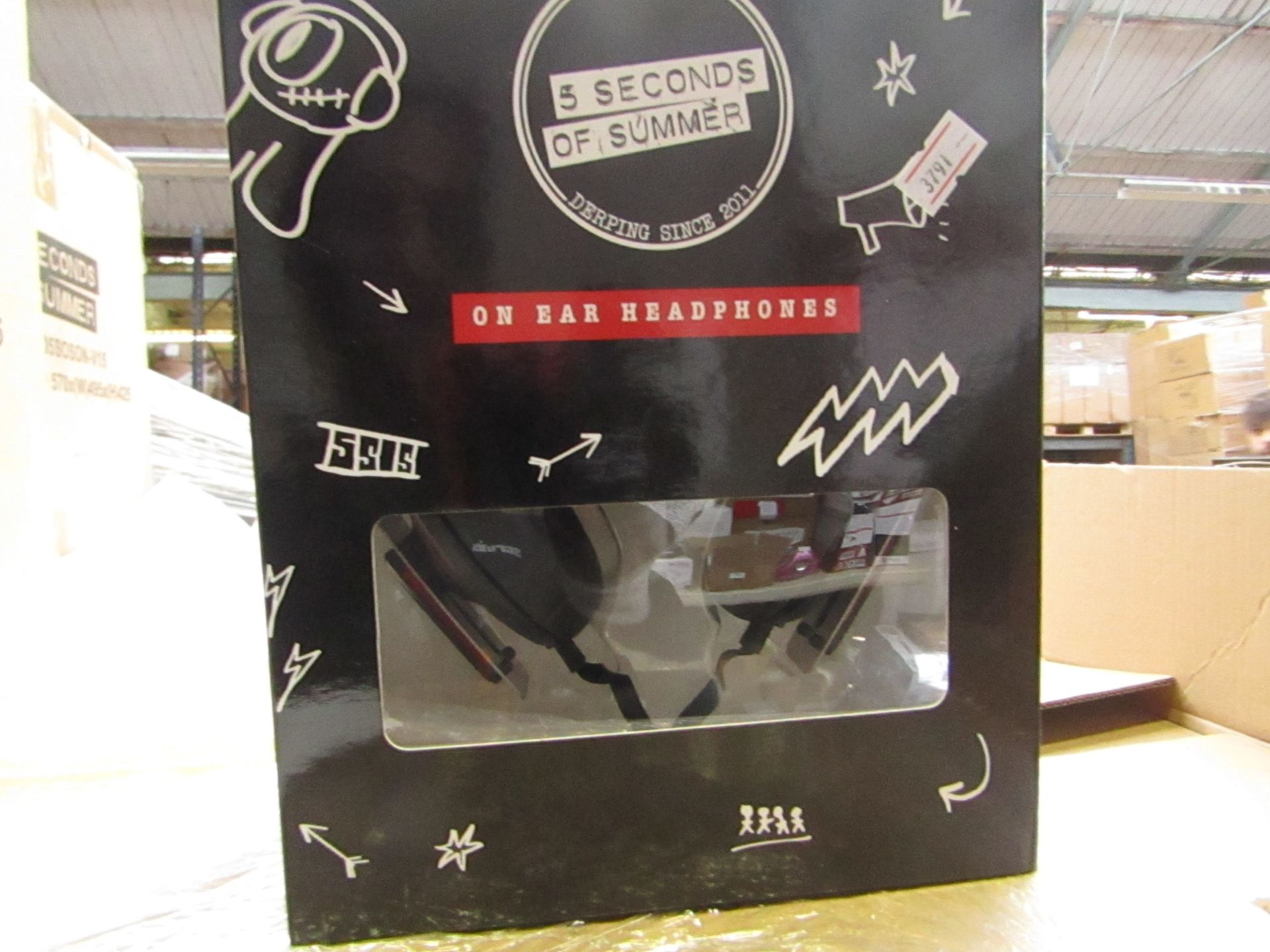 5x 5 Seconds of Summer headphones , new and boxed.
