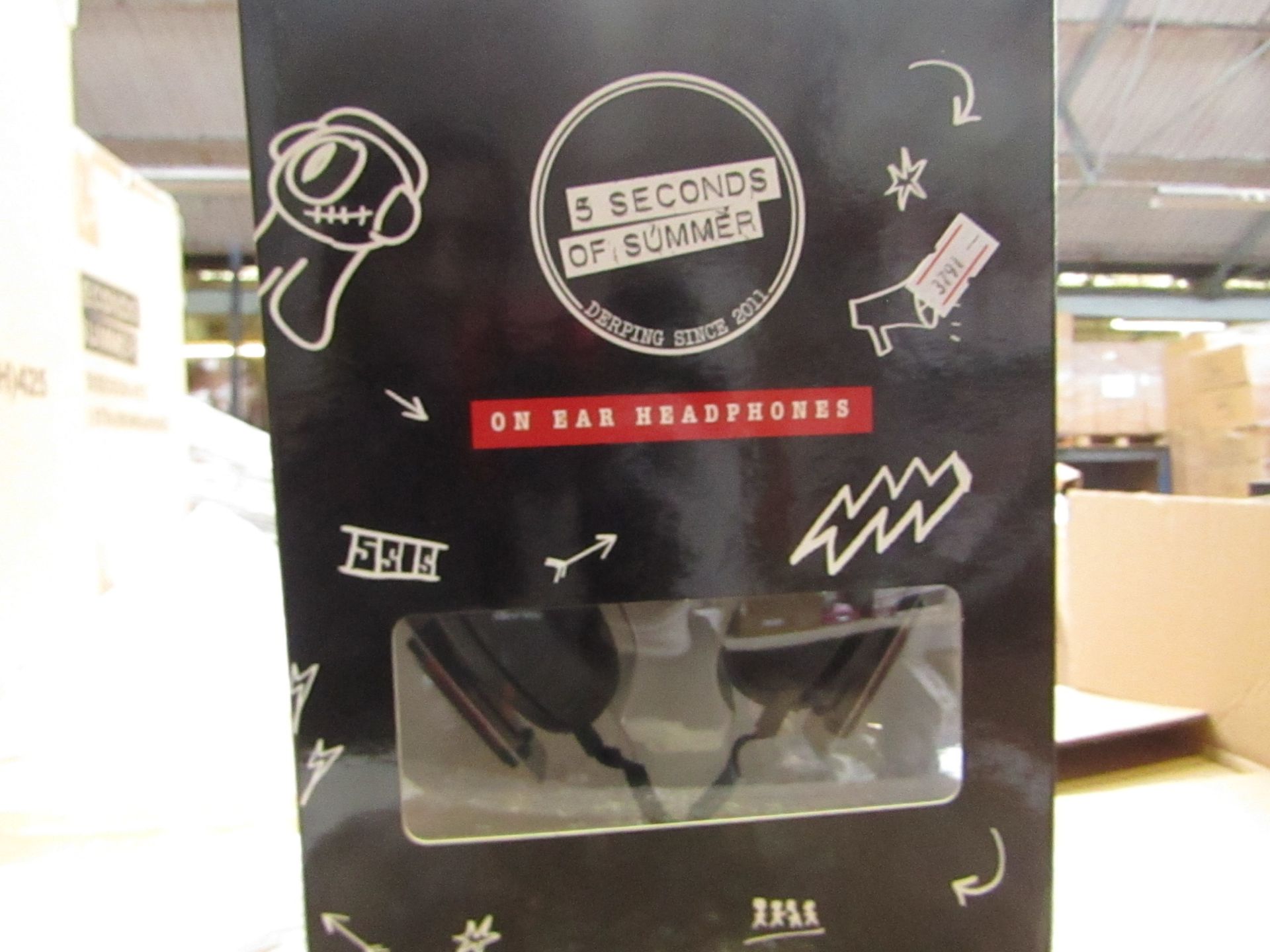 5 Seconds of Summer headphones , new and boxed.