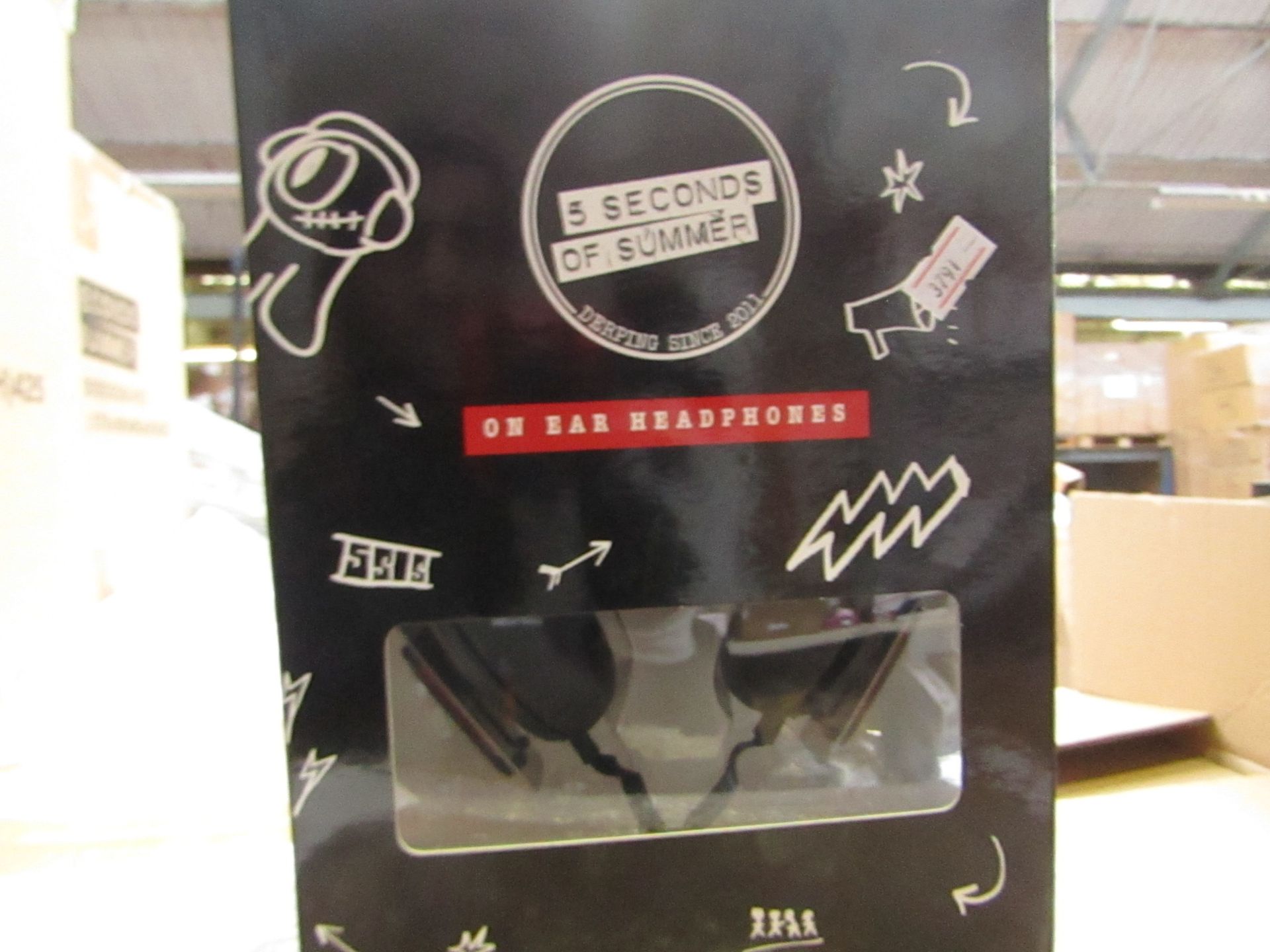 5 Seconds of Summer headphones , new and boxed.