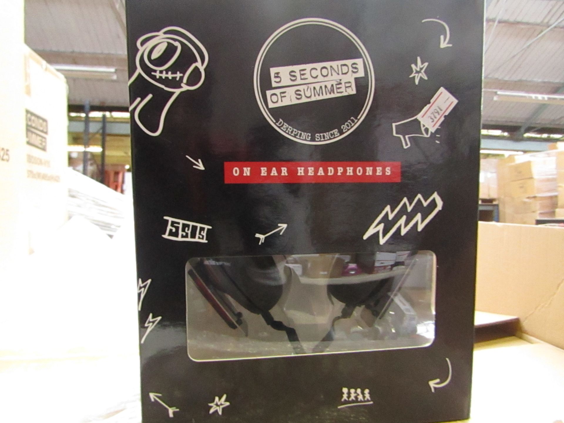 5 Seconds of Summer headphones , new and boxed.