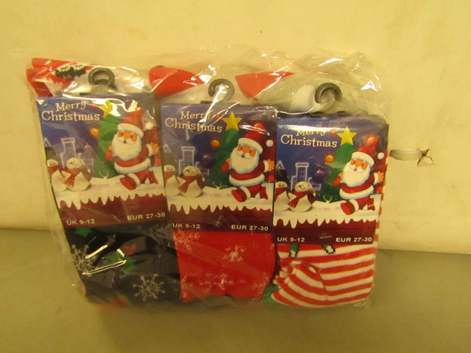 12 X Pairs of Christmas Themed Socks Size 9-12 New & Packaged
