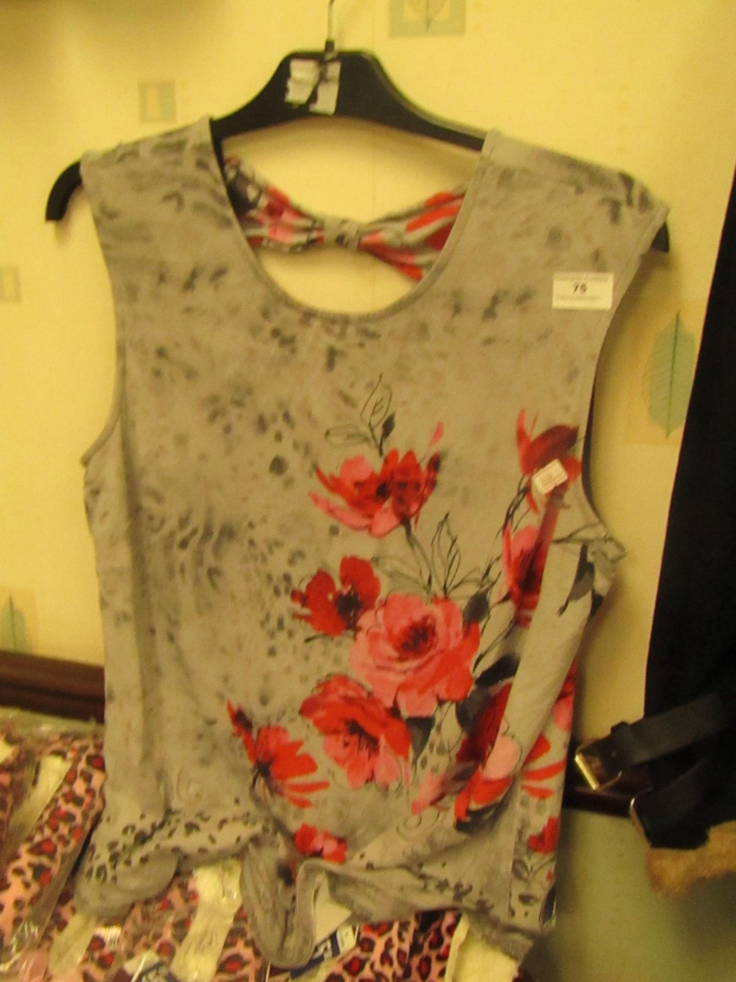 Ladies Top With Floral Design on Front Size 16,