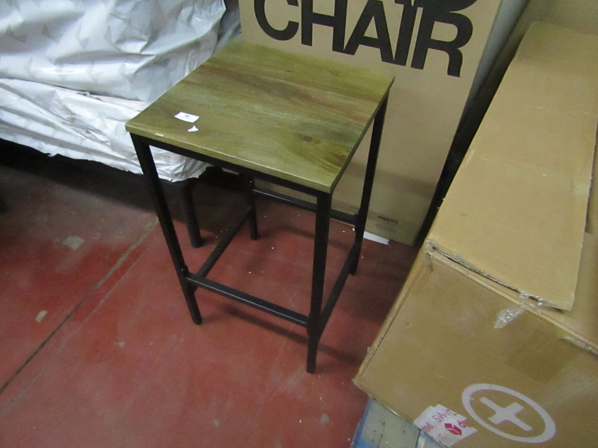 Metal and Wooden stool, the wood seat has a chip on one edge.