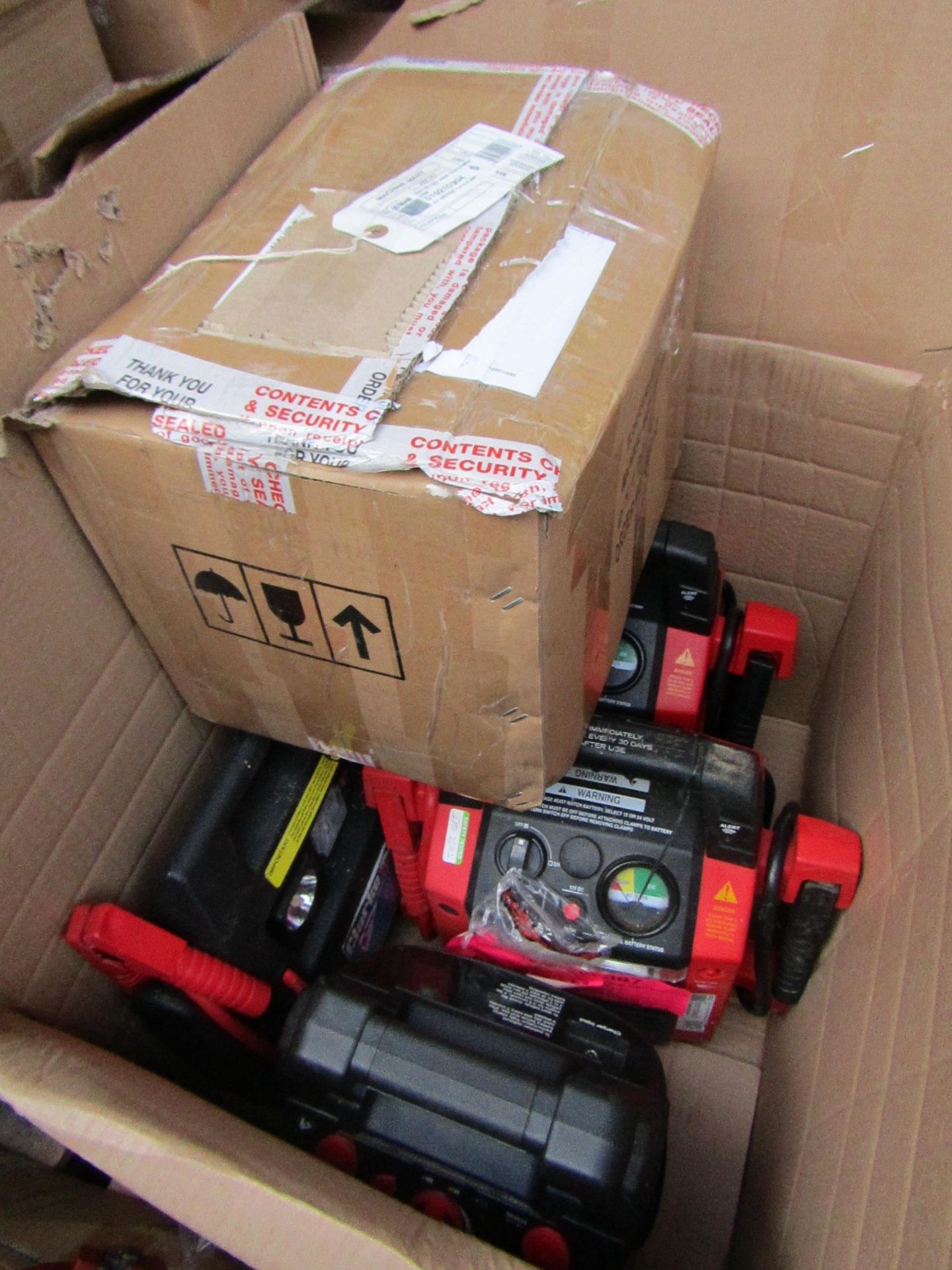 5x Items being 4 jump starters and a motor, This lot is a Machine Mart product which is raw and