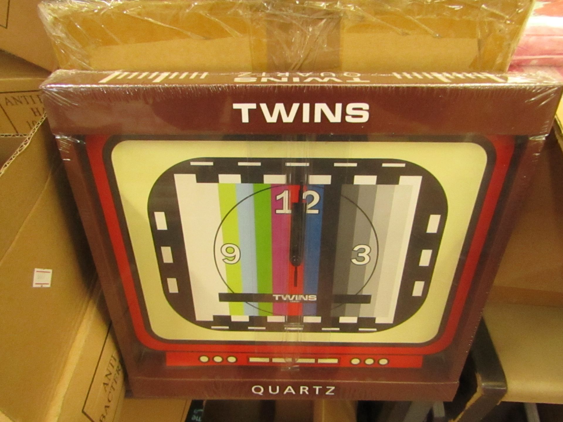 2 x Twins Quartz Wall Clocks new & packaged see image for design