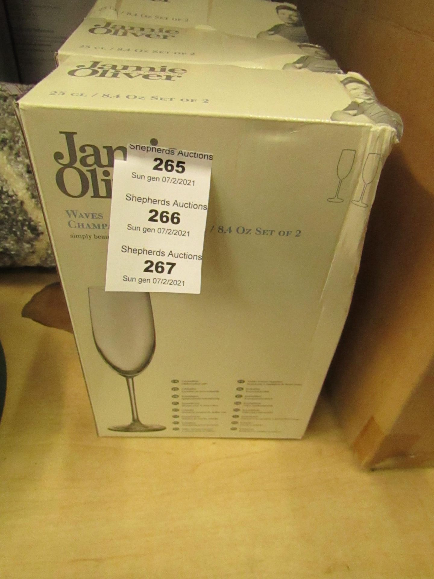 1 x Jamie Oliver set of 2 Waves 25cl Champange Glasses new & packaged ( packaging slightly damaged)