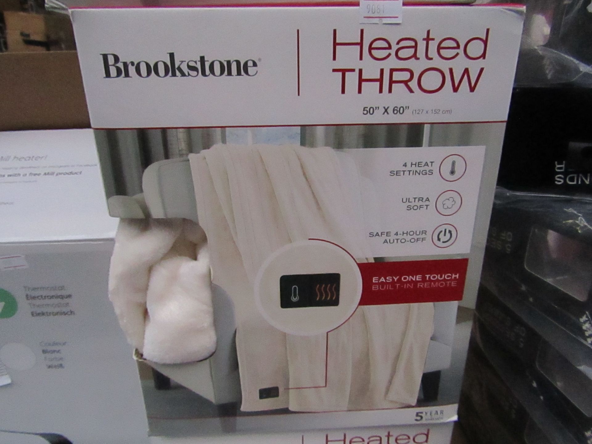 Brookstone heated throw 60 x 50", unchecked and boxed.