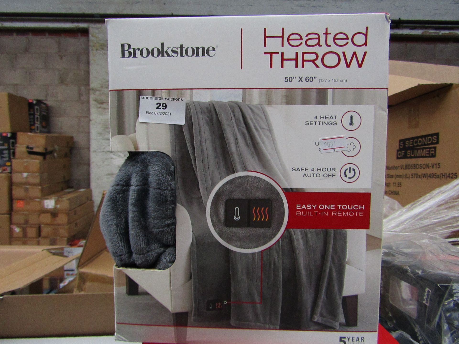 Brookstone heated throw 60 x 50", unchecked and boxed.