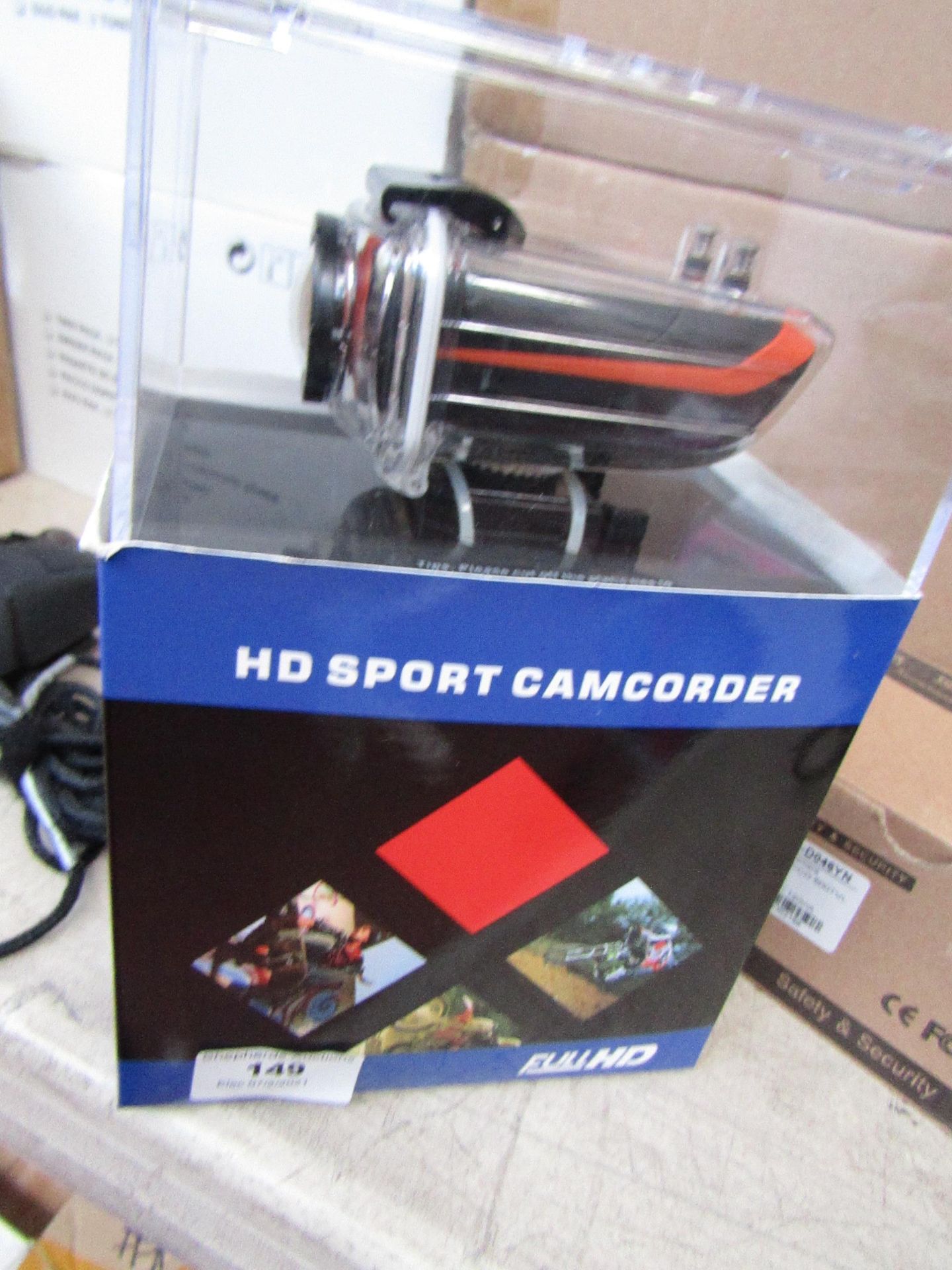 HD sport action camcorder with accessories, tested working and boxed.