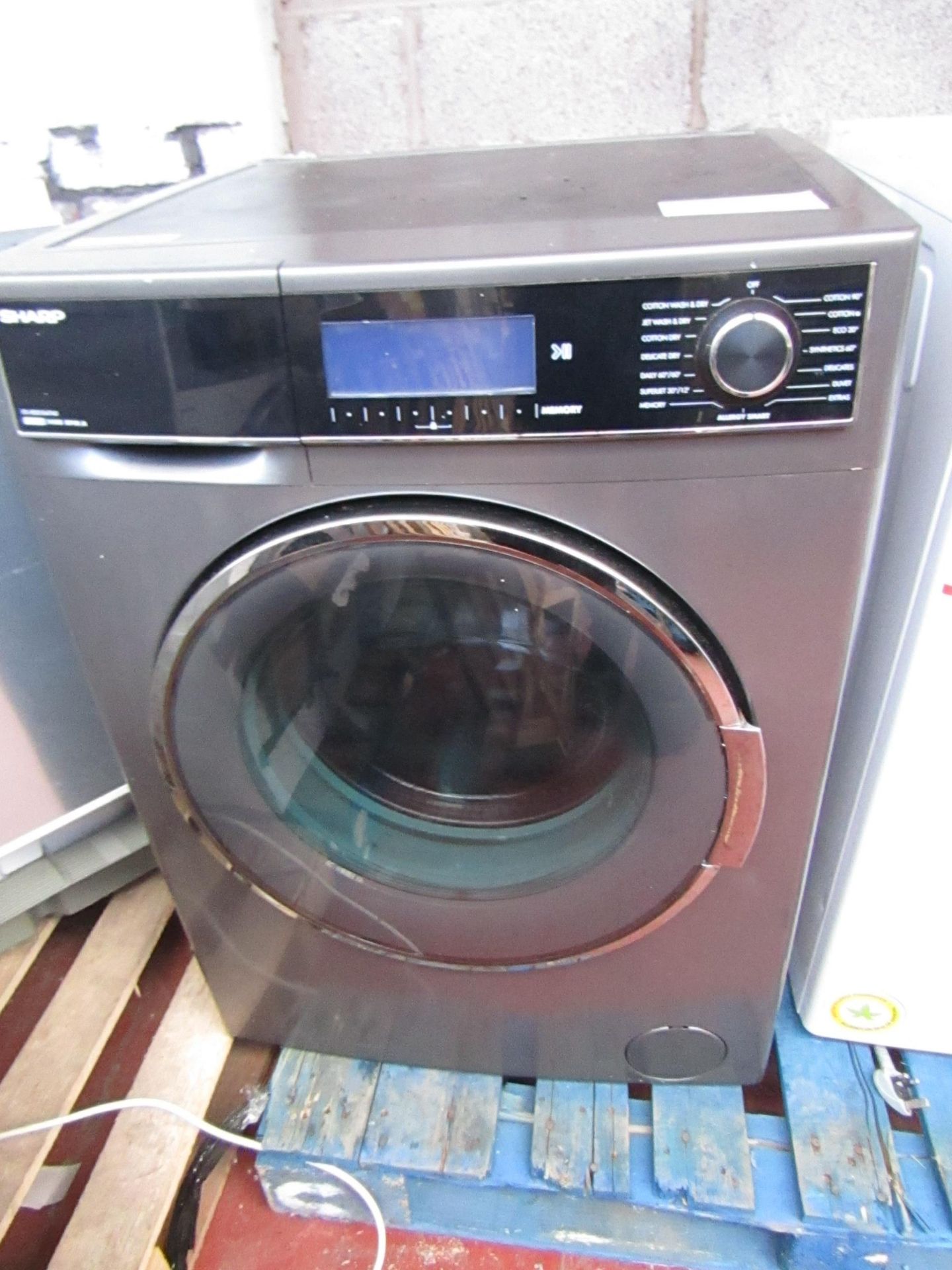Sharp 10/6kg washer / dryer, powers on but is unresponsive. Heat untested.